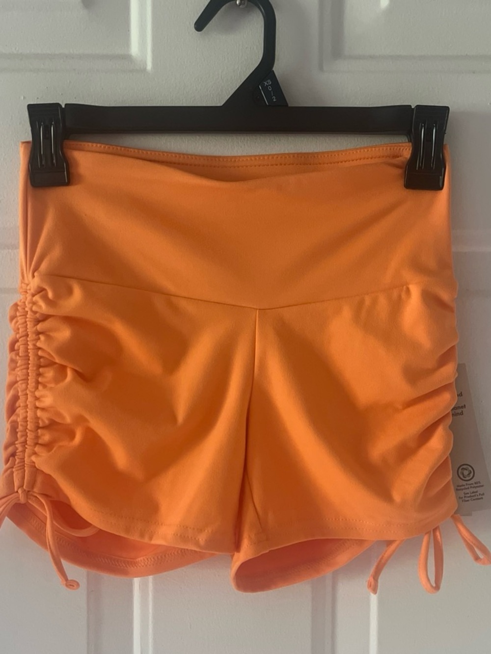 No Boundaries Bright Orange Ruched Side Tie Active Shorts